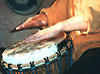 Playing Bass on Djembe Drum